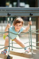 3 years baby  at playground  © Iakov Filimonov freepik